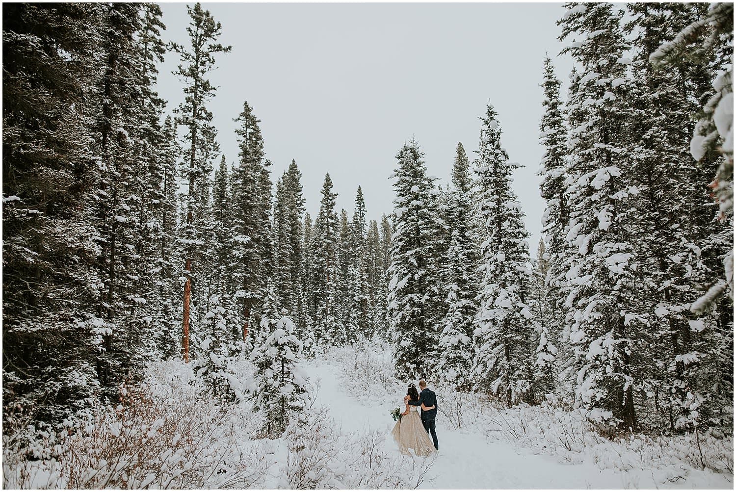 Elope in Banff. Bride and Groom during portraits at Storm Mountain Lodge. 