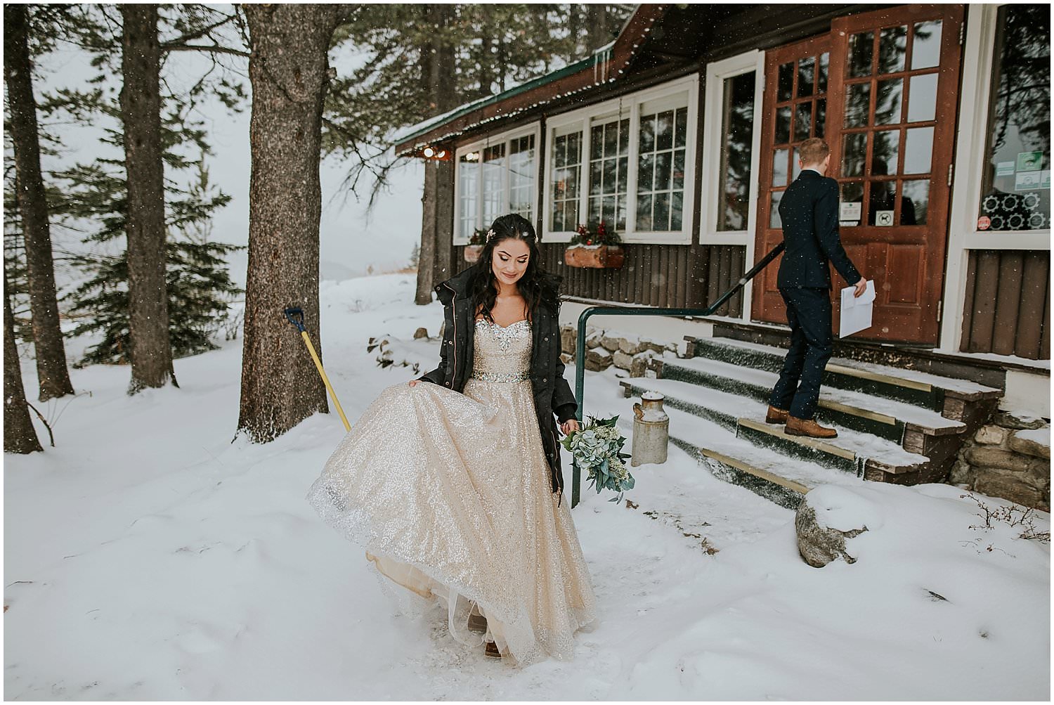 Bride leaving the lodge. Calgary wedding photographer at Storm Mountain Lodge in Banff National Park. 